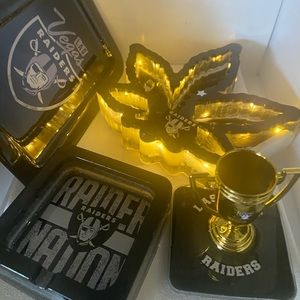 Raiders collectible designer tray, storage box, beer opener and magnets.